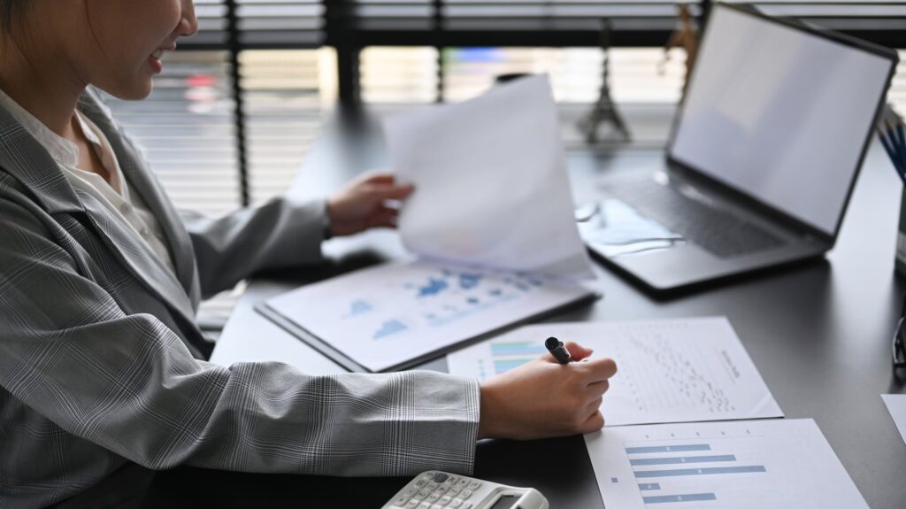 finance manager reviewing documents for credit management