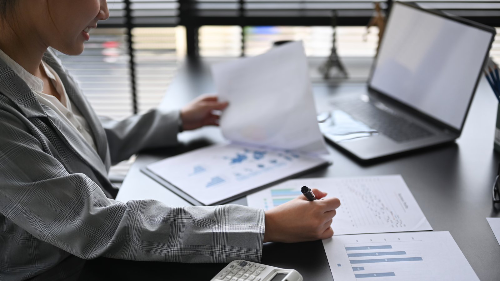 finance manager reviewing documents for credit management